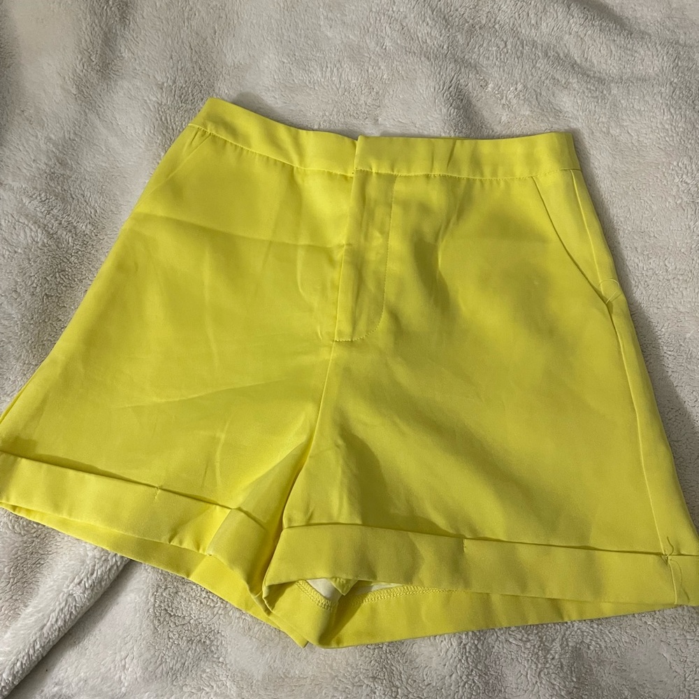 High-waisted yellow shorts for women